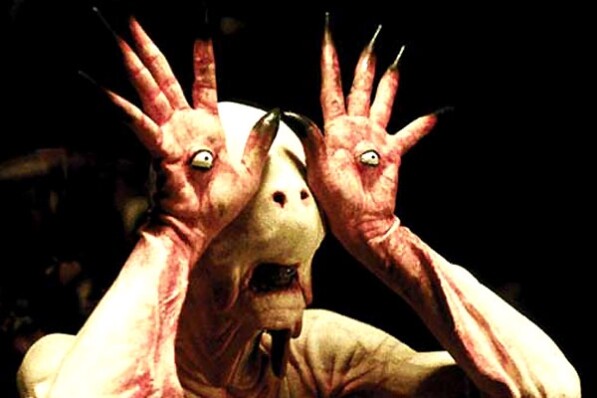 un monstre dont les yeux sont dans ses paumes