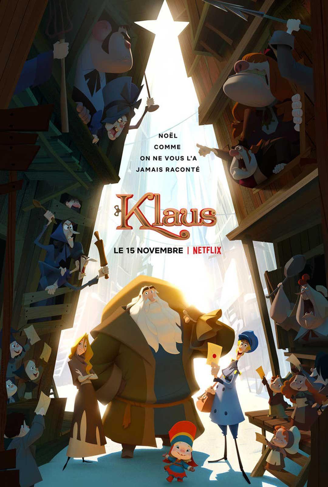 L'affiche du film Klaus avec le père noël , le facteur, la petite fille autochtone. L'ouverture de l'atelier dessine un sapin sur fond illuminé d'où viennent les personnages